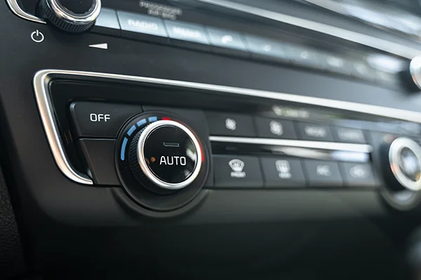 Close-up of air conditioner control knob